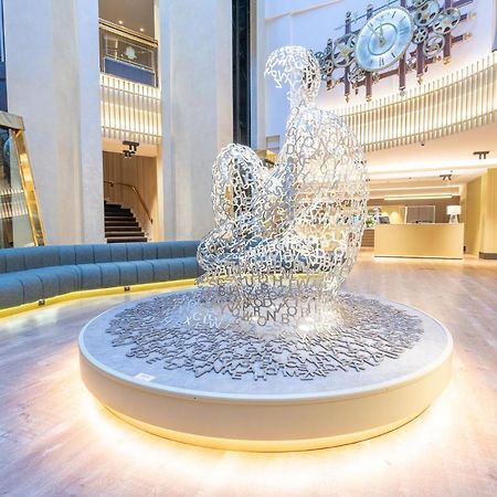 Grand Plaza Hotel & Wellness Andorra la Vella Bagian luar foto Fountain in the lobby of the hotel