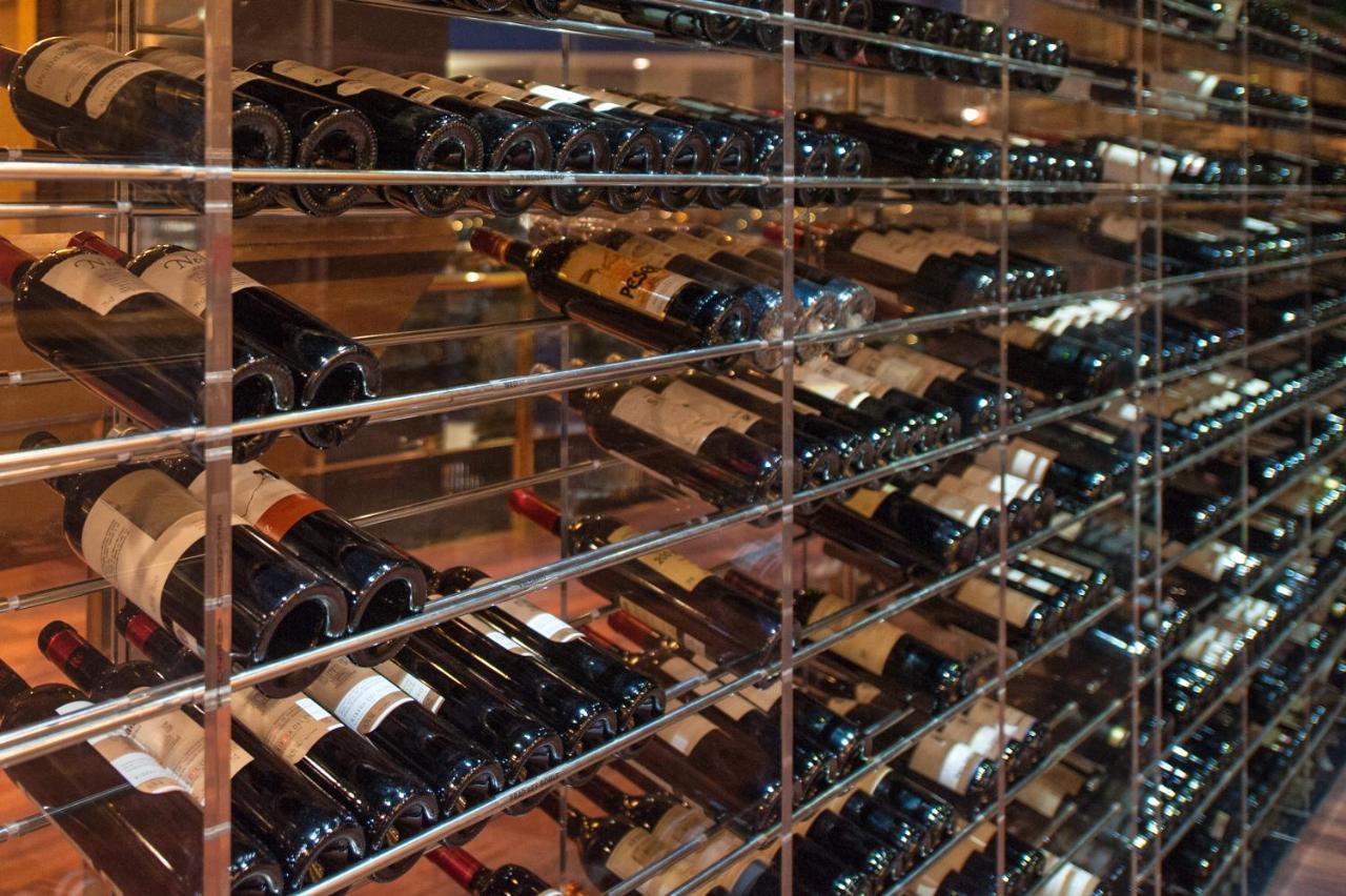 Grand Plaza Hotel & Wellness Andorra la Vella Bagian luar foto Wine bottles in a wine rack